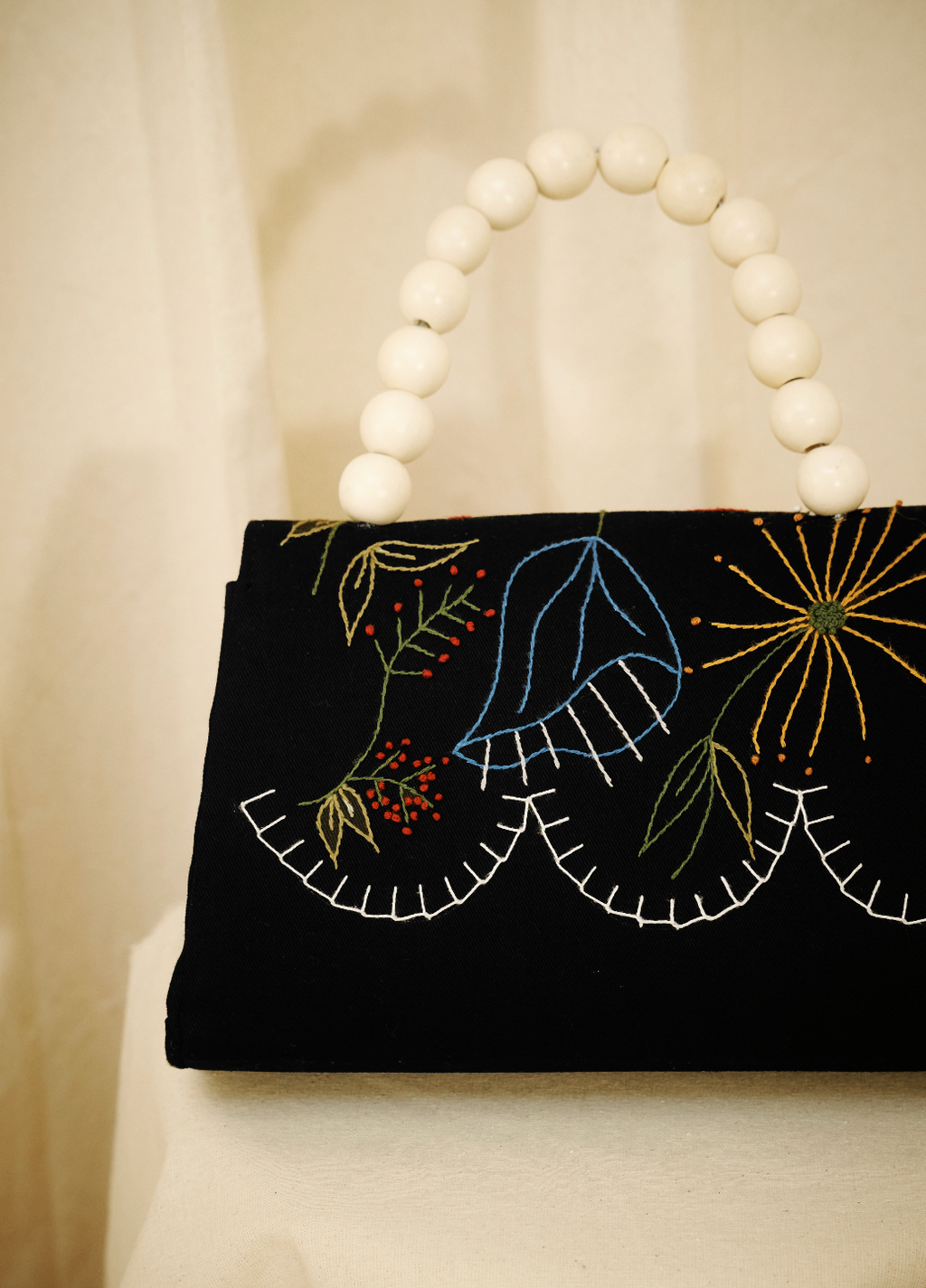 SAPHI  Handcrafted Top-Handle Clutch